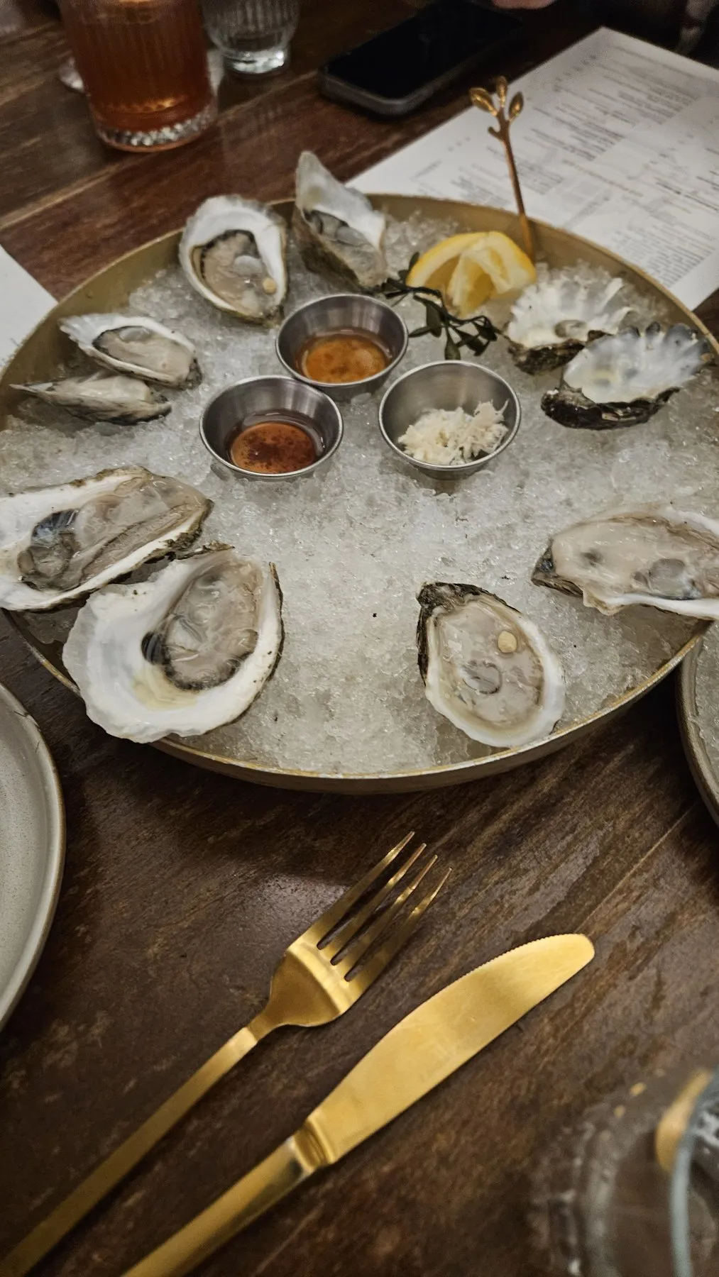 Platter of raw oysters on crushed ice