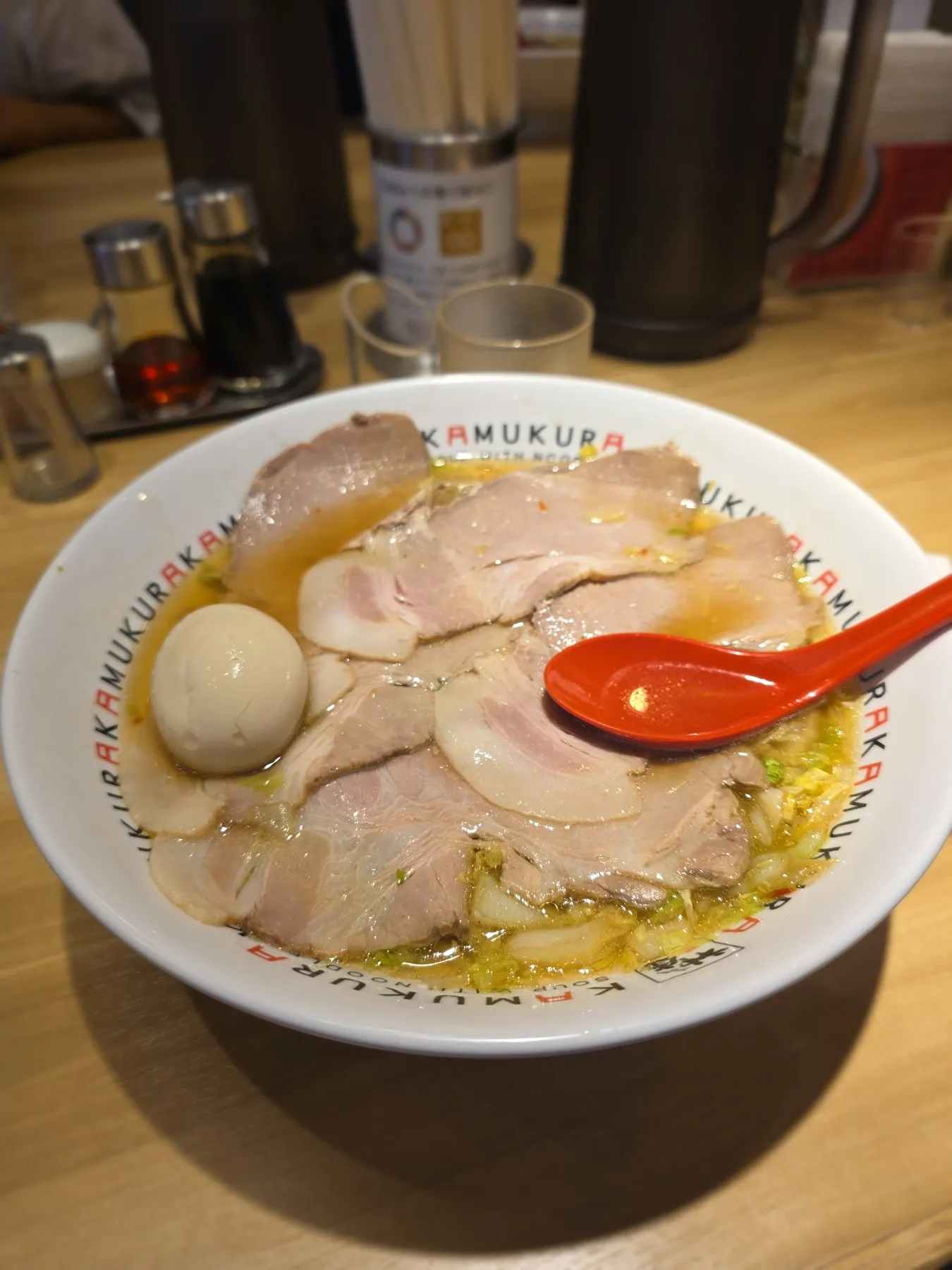 Bowl of Kamukura ramen with chashu and egg